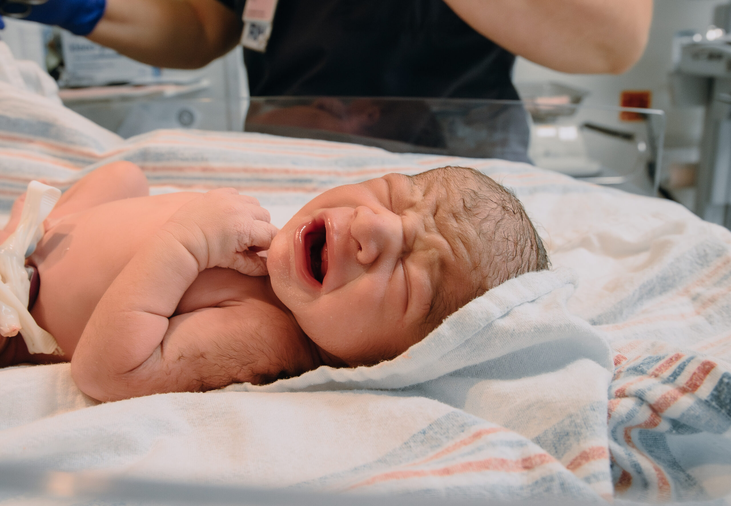 Newborn crying after birth